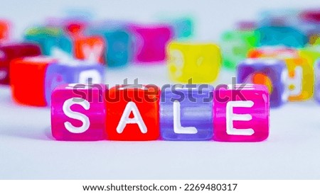 word "sale" on colorful cubes. fun concept about selling. inscription on the cubes. education sign series for education and learning