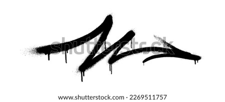 Graffiti arrow with overspray in black over white. Royalty-Free Stock Photo #2269511757