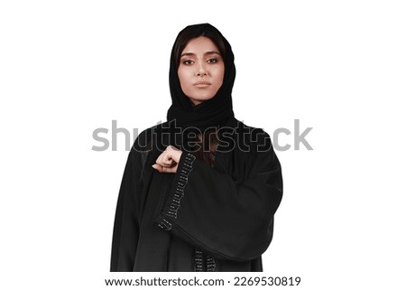 Arab woman wearing abaya proud and patriotic isolated Royalty-Free Stock Photo #2269530819