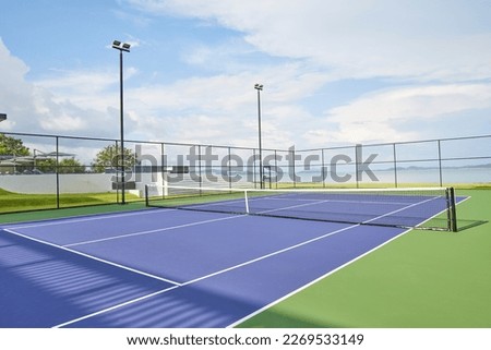 Seaside resort - Outdoor Tennis Court Royalty-Free Stock Photo #2269533149