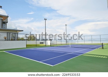 Seaside resort - Outdoor Tennis Court Royalty-Free Stock Photo #2269533153