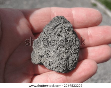 Black Lava Rock In Hand, Small Stone, Geology Photo