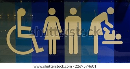 Restroom icon and Pictogram Man Woman on blue backgraund