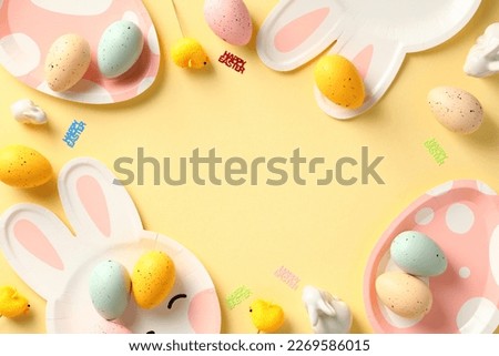 Happy Easter card template. Colorful Easter eggs and table serving cutlery on yellow background