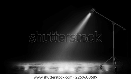 Professional photo studio equipment. Isolated on dark background. Realistic spotlight on ice. Stage light