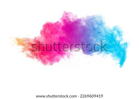 Pastel color dust particle splashing.Colorful powder explosion on white background. Royalty-Free Stock Photo #2269609419