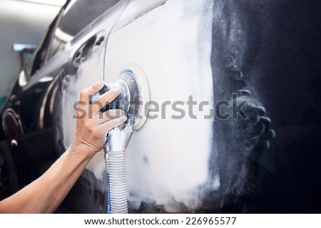 Car body work auto repair paint after the accident. Royalty-Free Stock Photo #226965577