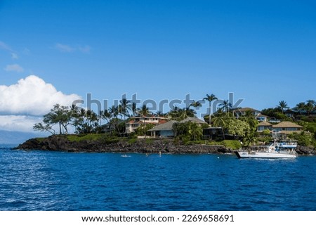Turtle town in the island of Maui. houses on the edge of the island by the ocean