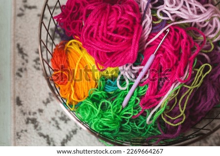 Basket of brightly colored yarn Royalty-Free Stock Photo #2269664267