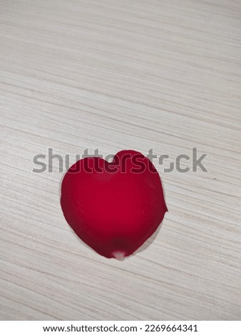 
A beautiful red flower petals with a heart shape
