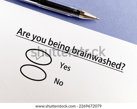 One person is answering question about trafficking. He thinks he is being brainwashed. Royalty-Free Stock Photo #2269672079