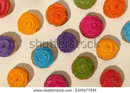 Colorful cupcakes. Delicious cupcakes background. Tasty cupcakes.