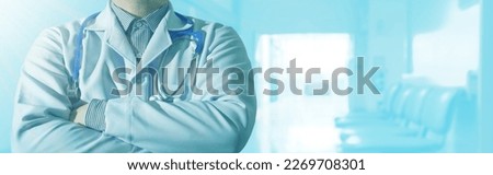 doctor cross arm confident in hospital blur background 
