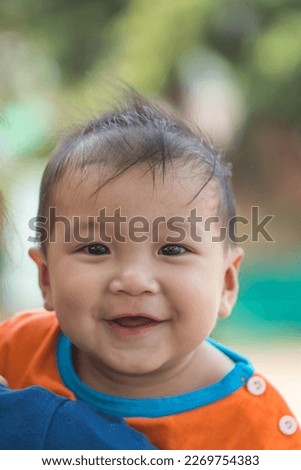 cute kid smile on nature background