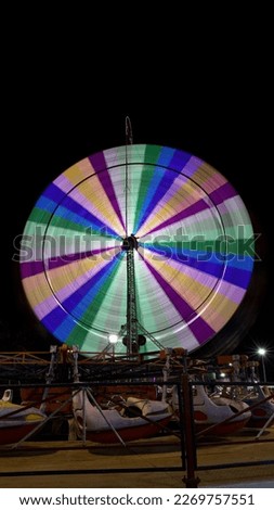 Colorful Ferris Wheel in a carnival park