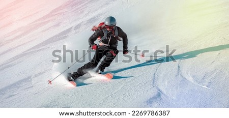 Girl On the Ski. Active winter holidays, skiing downhill in sunny day. Woman skier Royalty-Free Stock Photo #2269786387