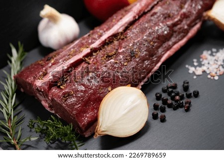 saddle of venison with herbs and spices Royalty-Free Stock Photo #2269789659