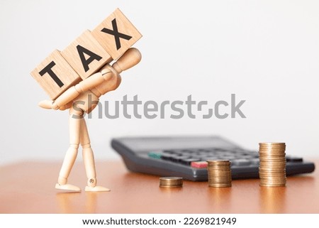 The burden of taxes and the importance of proper planning ease the financial burden. Royalty-Free Stock Photo #2269821949
