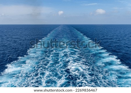 Stern wave of a ferry or cruise ship Royalty-Free Stock Photo #2269836467