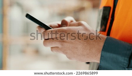 Social media, internet and hands of an architect with a phone for communication, construction website and building app. Construction worker working on a mobile, typing on web and doing search on site Royalty-Free Stock Photo #2269865899
