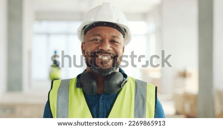 Construction, building and construction worker, man and smile in portrait, employee at construction site with work vest and safety helmet. Working, architecture industry and renovation job.