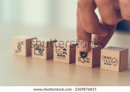 Work safety concept. Safety at workplace and compliance icons on wooden cube blocks. Working standard processes. Zero accidents. Using for safety awareness banner.