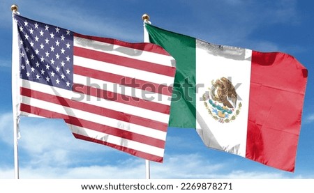 USA and Mexico flags against cloudy sky. waving in the sky