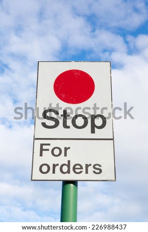 Stop for Orders railway sign instruction to train drivers.