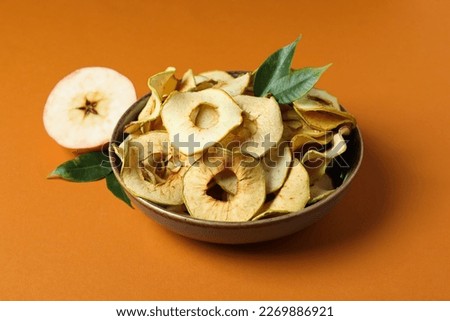 Concept of tasty food, dried apple chips