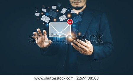 Man hand holding smartphone and show email screen on application mobile, Email message concept