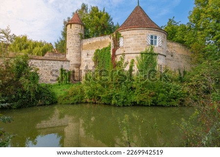 Dinkelsbuhl old town walls and lake reflection, medieval village in Romantic road of Bavaria, Germany