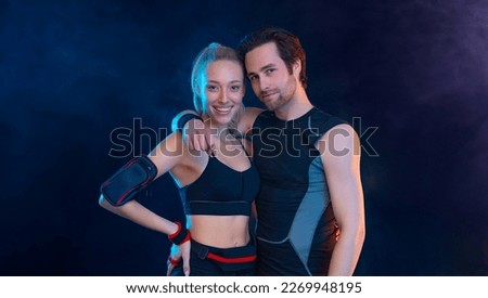 Fit woman Influencer at gym. Download photo for advertising a fitness club in social networks. Workout for women at home. Cover for sport motivation music. Runner concept. High resolution wallpaper