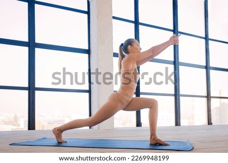 Download picture for promotion yoga classes. Yoga asana Indoor. Sports recreation. Beautiful young woman in yoga pose. Individual sports.