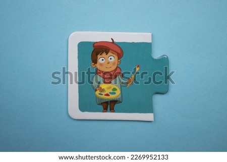 Colorful, painterly illustrated educational puzzle pieces placed on a blue background.