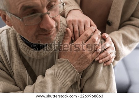 Two people holding hand together. elderly man and support woman Royalty-Free Stock Photo #2269968863