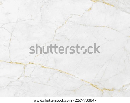 White and gold marble luxury wall texture with shiny golden veins pattern abstract background design for a cover book or wallpaper and banner website.