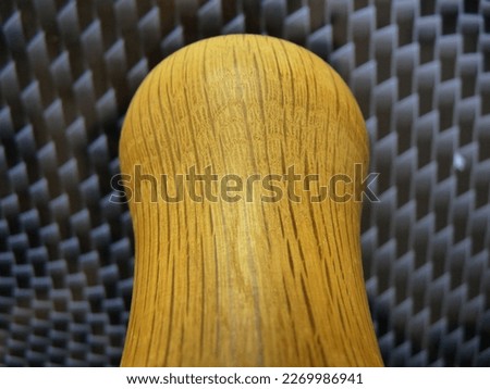 Wooden texture on handmade handle effect Carbon Fiber background