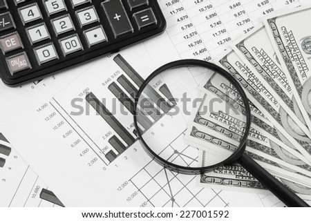 Business concept with calculator, money and documents 