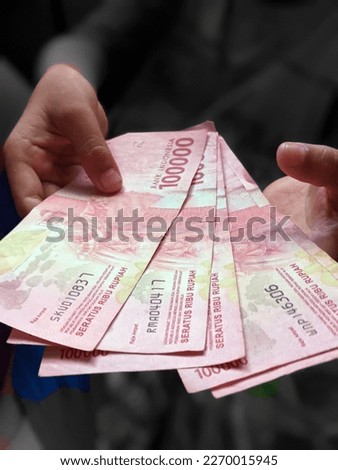 illustration of an employee or employee receiving a salary in rupiah