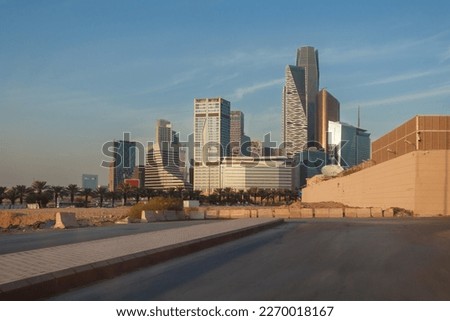 Riyadh roads and streets are filled with ornamental trees on both sides of the road, downtown, Riyadh skyline, King Abdullah Financial District, Saudi Arabia Royalty-Free Stock Photo #2270018167