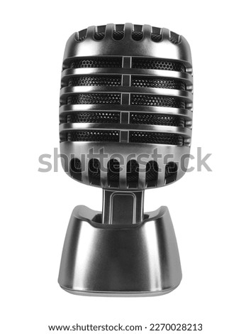 Classic retro dynamic vocal microphone old vintage style live performance studio recording isolated on white background. Memory concept idea music sound item