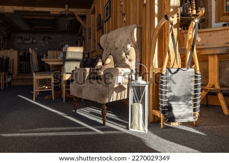 Part of the interior of an Austrian restaurant lit by bright morning light, Austria Royalty-Free Stock Photo #2270029349