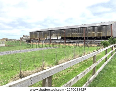 Picture of a farm barn and open field