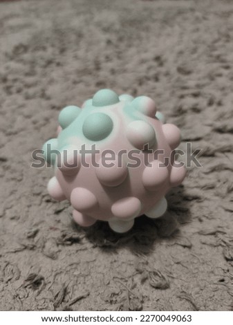 Ball pop-it. Antistress. Colorful  ball on a background