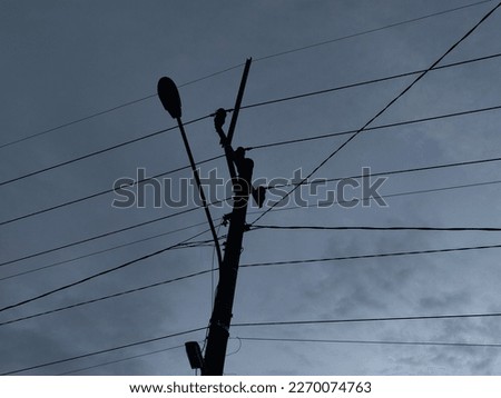 Electric Cable Pole with sky background Royalty-Free Stock Photo #2270074763