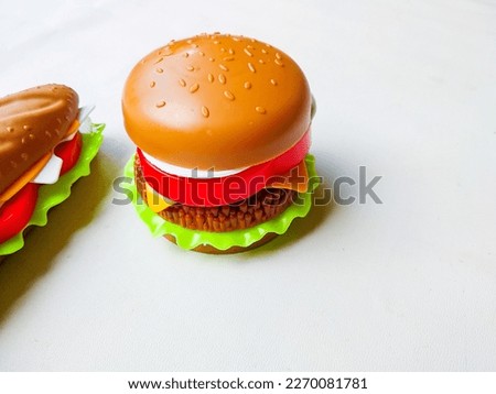 Kids toy, burger and hotdog made from plastic. Disassembly toy. 