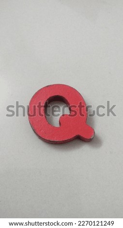 Alphabet Q made by wooden, Q looks like Question