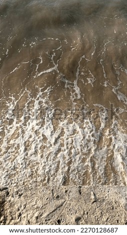Bubbling wave from coast at Kelapa Lima Beach, Kupang
