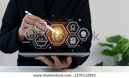 Businessman using laptop with AI tech auto insurance service concept, insurance data management, fast solve problem, service, digital transformation, certification, protection, digital application. Royalty-Free Stock Photo #2270132893