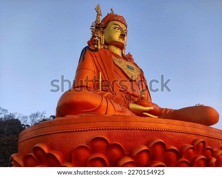 Beautiful lotus buddha ideol with blue sky at background HD